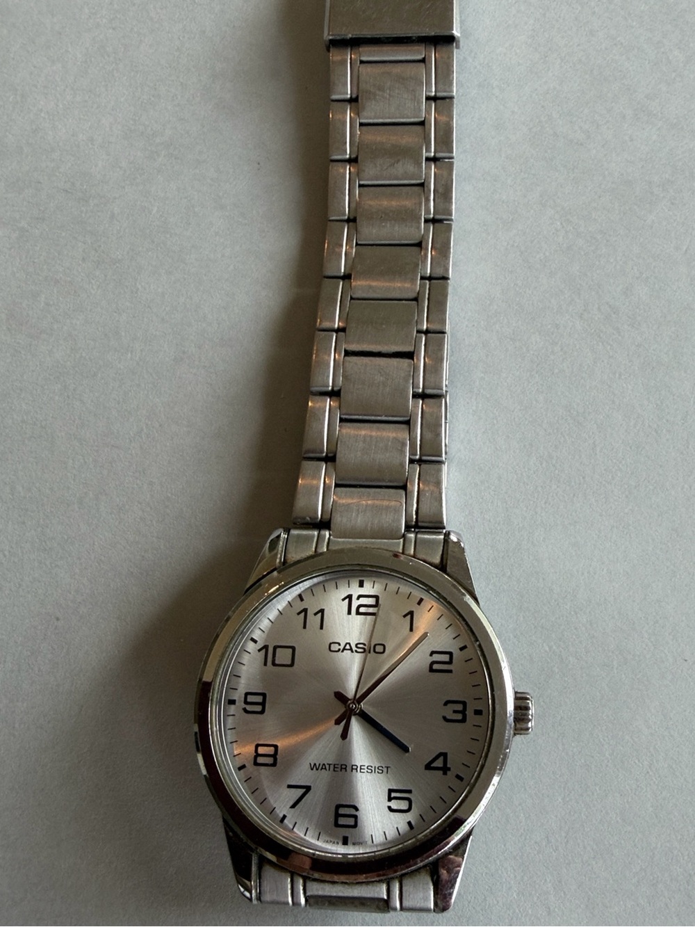 Casio Men's Silver Stainless Steel Working Analog Watch with Black Numerals